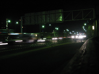 Coming over the bridge, the car lights blur together...