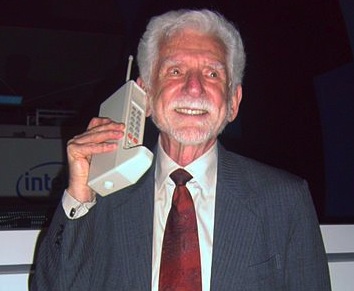 Dr Martin Cooper with prototype DynaTAC mobile phone